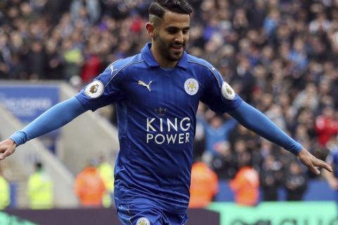 Leicester City's Riyad Mahrez celebrates scoring his side's second goal of the game during the English Premier League soccer match Leicester City against Watford at the King Power Stadium, Leicester, England, Saturday May 6, 2017. (Nick Potts/PA via AP)