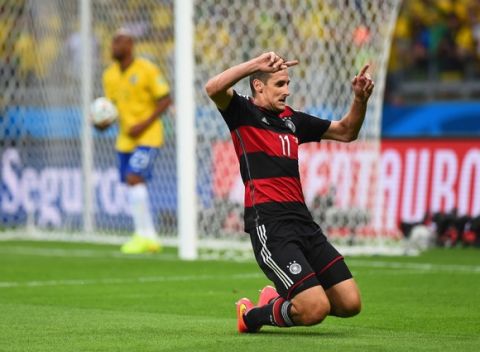 BELO HORIZONTE, BRAZIL - JULY 08:  Miroslav Klose of Germany celebrates scoring his team's second goal during the 2014 FIFA World Cup Brazil Semi Final match between Brazil and Germany at Estadio Mineirao on July 8, 2014 in Belo Horizonte, Brazil.  (Photo by Laurence Griffiths/Getty Images)