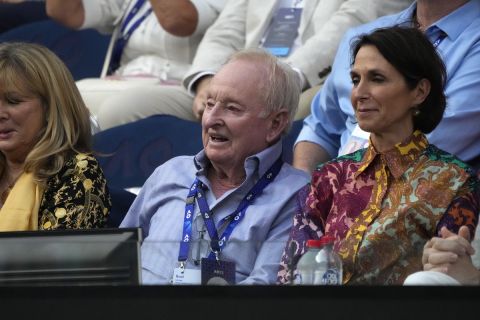 Former Australian Open champion Rod Laver, center, watches the fourth round match between Stefanos Tsitsipas of Greece and Jannik Sinner of Italy at the Australian Open tennis championship in Melbourne, Australia, Sunday, Jan. 22, 2023. (AP Photo/Mark Baker)