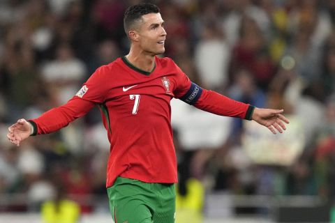 Portugal's Cristiano Ronaldo celebrates after the UEFA Nations League soccer match between Portugal and Scotland at the Luz stadium in Lisbon, Portugal, Sunday, Sept. 8, 2024. (AP Photo/Armando Franca)