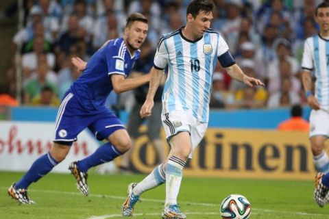 RIO DE JANEIRO, BRAZIL - JUNE 15: Lionel Messi of Argentina in action during the 2014 FIFA World Cup Brazil Group F match between Argentina and Bosnia-Herzegovina at Maracana stadium on June 15, 2014 in Rio de Janeiro, Brazil. (Photo by Jean Catuffe/Getty Images)