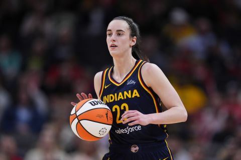 Indiana Fever's Caitlin Clark dribbles during the second half of an WNBA preseason basketball game against the Atlanta Dream, Thursday, May 9, 2024, in Indianapolis. (AP Photo/Darron Cummings)