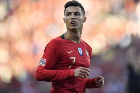 Portugal's Cristiano Ronaldo gestures during the UEFA Nations League final soccer match between Portugal and Netherlands at the Dragao stadium in Porto, Portugal, Sunday, June 9, 2019. (AP Photo/Martin Meissner)