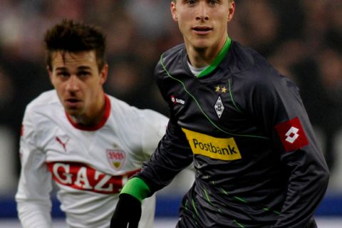 Stuttgart's forward Martin Harnik (L) and Moenchengladbach's Swedish defender Oscar Wendt vie for the ball during the German first division Bundesliga football match VfB Stuttgart vs Borussia Moenchengladbach in the southern German city of Stuttgart on January 29, 2012.  AFP PHOTO / THOMAS KIENZLE

RESTRICTIONS / EMBARGO - DFL LIMITS THE USE OF IMAGES ON THE INTERNET TO 15 PICTURES (NO VIDEO-LIKE SEQUENCES) DURING THE MATCH AND PROHIBITS MOBILE (MMS) USE DURING AND FOR FURTHER TWO HOURS AFTER THE MATCH. FOR MORE INFORMATION CONTACT DFL. (Photo credit should read THOMAS KIENZLE/AFP/Getty Images)