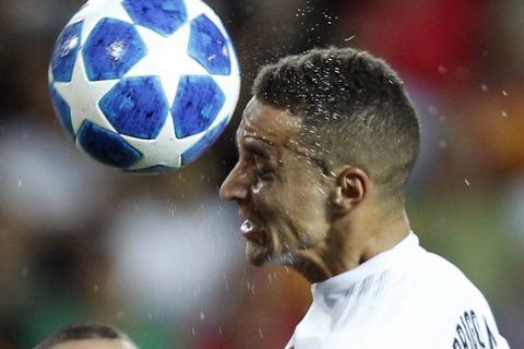 Valencia forward Rodrigo heads the Ball during the Champions League, group H soccer match between Valencia and Juventus, at the Mestalla stadium in Valencia, Spain, Wednesday, Sept. 19, 2018. (AP Photo/Alberto Saiz)