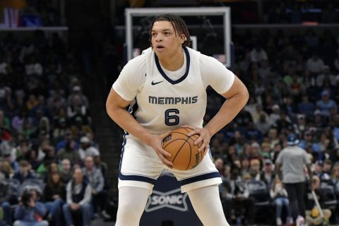 Memphis Grizzlies forward Kenneth Lofton Jr. (6) plays in the first half of an NBA basketball game against the Boston Celtics Sunday, Nov. 19, 2023, in Memphis, Tenn. (AP Photo/Brandon Dill)