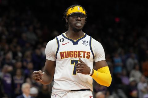 Denver Nuggets guard Reggie Jackson (7) during the first half of an NBA basketball game against the Phoenix Suns, Thursday, April 6, 2023, in Phoenix. (AP Photo/Rick Scuteri)