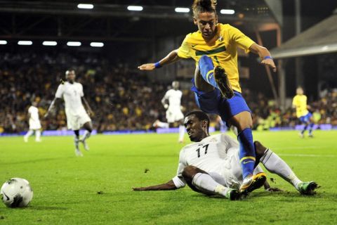 Brazil's striker Neymar (R) vies for the ball with Ghana's defender Lee Addy during the international friendly football match between Brazil and Ghana, at the Craven Cottage in London, on September 5, 2011. AFP PHOTO/GLYN KIRK (Photo credit should read GLYN KIRK/AFP/Getty Images)