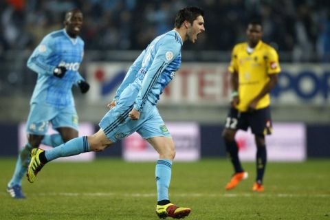 Olympique Marseille's Andre-Pierre Gignac (C) celebrates his goal against Sochaux during their French Ligue 1 soccer match in Sochaux February 12, 2011. REUTERS/Vincent Kessler  (FRANCE - Tags: SPORT SOCCER)