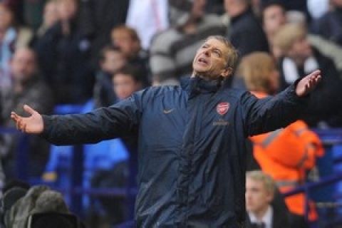 Arsenal manager Arsene Wenger reacts during the English Premier league football match against Bolton at The Reebok Stadium , Bolton, north-west , England , on March 29 2008. AFP PHOTO/ANDREW YATES  Mobile and website use of domestic English football pictures are subject to obtaining a Photographic End User Licence from Football DataCo Ltd Tel : +44 (0) 207 864 9121 or e-mail accreditations@football-dataco.com - applies to Premier and Football League matches. (Photo credit should read ANDREW YATES/AFP/Getty Images)