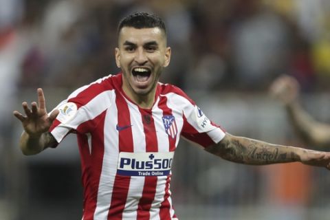 Atletico Madrid's Angel Correa celebrates after scoring his side's third goal during the Spanish Super Cup semifinal soccer match between Barcelona and Atletico Madrid at King Abdullah stadium in Jiddah, Saudi Arabia, Thursday, Jan. 9, 2020. (AP Photo/Hassan Ammar)