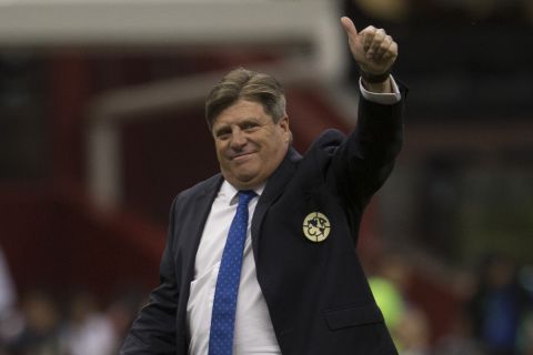 America's coach Miguel Herrera walks on the pitch after a Mexico soccer league match against Tigres, at Azteca Stadium in Mexico City, Saturday, Jan.18, 2020. (AP Photo/Christian Palma)