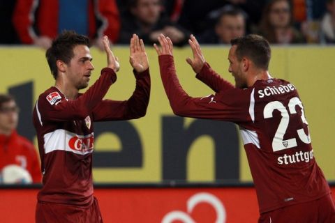 AUGSBURG, GERMANY - APRIL 10:  Martin Harnik (L) of Stuttgart celebrates scoring the 2nd team goal with his team mate Julian Schieber during the Bundesliga match between FC Augsburg and VfB Stuttgart at SGL Arena on April 10, 2012 in Augsburg, Germany.  (Photo by Alexander Hassenstein/Bongarts/Getty Images)