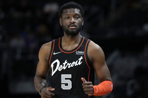 Detroit Pistons forward Chimezie Metu runs up court during the second half of an NBA basketball game against the Indiana Pacers, Wednesday, March 20, 2024, in Detroit. (AP Photo/Carlos Osorio)