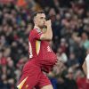 Liverpool's Diogo Jota celebrates after scoring his side's first goal during the English League Cup soccer match between Liverpool and West Ham United at Anfield Stadium, Liverpool, England, Wednesday, Sept. 25, 2024. (AP Photo/Jon Super)