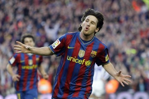 Barcelona's Lionel Messi celebrates a goal against Valladolid during their Spanish first division soccer match at Camp Nou stadium in Barcelona May 16, 2010. REUTERS/ Albert Gea (SPAIN - Tags: SPORT SOCCER)