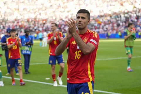 Spain's Rodri celebrates at the end of a Group B match between Spain and Croatia at the Euro 2024 soccer tournament in Berlin, Germany, Saturday, June 15, 2024. (AP Photo/Ebrahim Noroozi)