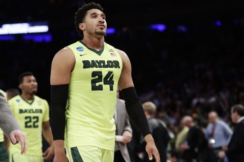 Baylor guard Ishmail Wainright (24) walks off the court after losing to South Carolina in an East Regional semifinal game of the NCAA men's college basketball tournament, Friday, March 24, 2017, in New York. South Carolina won 70-50. (AP Photo/Frank Franklin II)