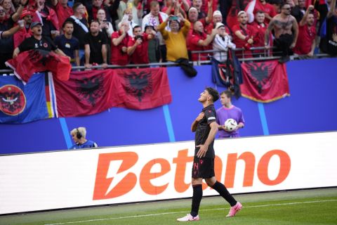 Albania's Qazim Laci celebrates after scoring the opening goal during a Group B match between Croatia and Albania at the Euro 2024 soccer tournament in Hamburg, Germany, Wednesday, June 19, 2024. (AP Photo/Ebrahim Noroozi)