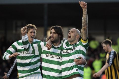 BERWICK, ENGLAND-JANUARY 09: Daniel Majstorovic of Celtic celebrates with Georgious Samaras and Thomas Rogne after scoring during the Scottish FA Cup 4th Round match between Berwick Rangers and Celtic at Shielfield Park, on January 09, 2011 in Berwick, United Kingdom.  (Photo by Jeff J Mitchell/Getty Images)