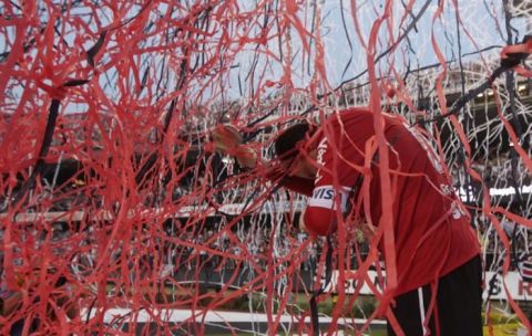 Sao Paulo FC' s goalkeeper Rogerio Ceni is covered by confetti at the end of a Brazilian soccer league game against Atletico Mineiro in Sao Paulo, Brazil, Wednesday, Sept. 7, 2011. Ceni played the 1000th game for his team, Sao Paulo, that won 2-1. (AP Photo/Andre Penner)