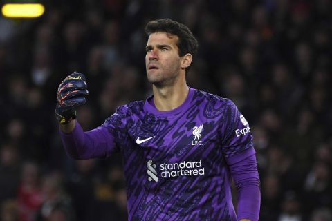 Liverpool's goalkeeper Alisson during the English Premier League soccer match between Wolverhampton Wanderers and Liverpool at Molineux stadium in Wolverhampton, England, Saturday, Sept. 28, 2024. (AP Photo/Rui Vieira)