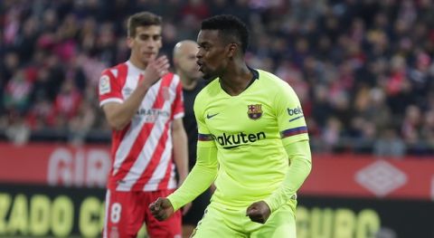 FC Barcelona's Semedo celebrates after scoring his side's first goal during the Spanish La Liga soccer match between Girona and FC Barcelona at the Montilivi stadium in Girona, Spain, Sunday, Jan. 27, 2019. (AP Photo/Manu Fernandez)