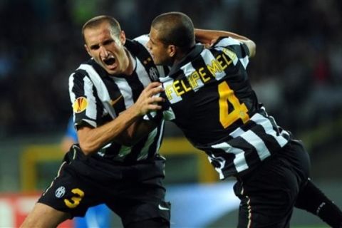 Juventus' Giorgio Chiellini, left, celebrates with teammate Felipe Melo after scoring second goal during an Europa League, Group A, first-leg soccer match between Juventus and Lech Poznan , at the Turin stadium, Italy, Thursday, Sept. 16 2010. (AP Photo/Massimo Pinca)