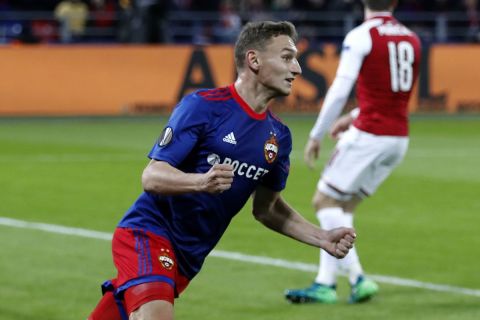 CSKA's Fedor Chalov celebrates after scoring his side's opening goal during the Europa League quarterfinal, second leg soccer match between CSKA Moscow and Arsenal at the CSKA Arena, in Moscow, Russia, Thursday, April 12, 2018. (AP Photo/Pavel Golovkin)