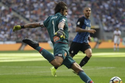 Genoa goalkeeper Mattia Perin controls the ball during a Serie A soccer match between Inter Milan and Genoa, at the San Siro stadium in Milan, Italy, Sunday, Sept. 24, 2017. (AP Photo/Luca Bruno)