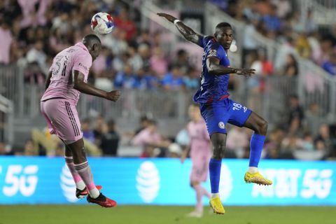 Inter Miami defender Kamal Miller (31) and Cruz Azul forward Diber Cambindo (28) go after the ball during the first half of a Leagues Cup soccer match, Friday, July 21, 2023, in Fort Lauderdale, Fla. (AP Photo/Lynne Sladky)