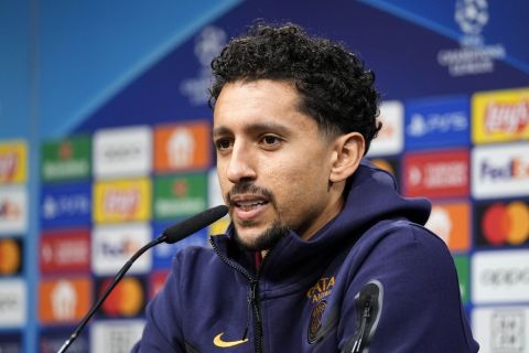 PSG's Marquinhos talks to the media at a press conference ahead of the Champions League Group F soccer match between Borussia Dortmund and Paris Saint-Germain in Dortmund, Germany, Tuesday, Dec. 12 , 2023. (AP Photo/Martin Meissner)