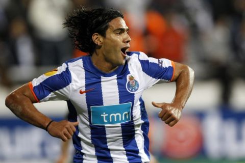 Porto's Falcao celebrates his goal against Besiktas during their Europa League Group L soccer match in Istanbul October 21, 2010. REUTERS/Murad Sezer (TURKEY - Tags: SPORT SOCCER)