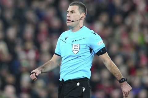 Referee Rade Obrenovic during the Europa League Group E soccer match between Liverpool and Toulouse, at Anfield in Liverpool, England, Thursday, Oct. 26, 2023. (AP Photo/Jon Super)