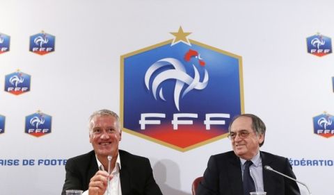 French Football Federation (FFF) President Noel Le Graet (R) and newly-named coach of the national football team Didier Deschamps give a press conference on July 9, 2012 at the FFF headquarters in Paris. The 43-year-old - who captained France to the 1998 World Cup and Euro 2000 trophies - Deschamps replaces fellow World Cup and Euro winning teammate Laurent Blanc, who turned down a new two year contract last weekend.     AFP PHOTO PATRICK KOVARIK        (Photo credit should read PATRICK KOVARIK/AFP/GettyImages)