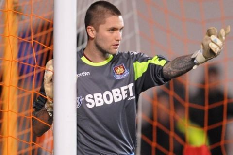 West Ham United's Henri Lansbury plays as goalkeeper after taking over from Robert green who was sent off