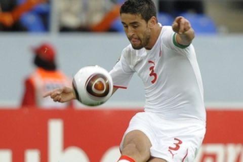 Karim Haggui, Captain of Tunisia's national football team plays a shot during their group stage match at the African Cup of Nations CAN2010 at the Tundavala stadium in Lubango, Angola on January 17, 2010.
AFP PHOTO/GIANLUIGI GUERCIA (Photo credit should read GIANLUIGI GUERCIA/AFP/Getty Images)