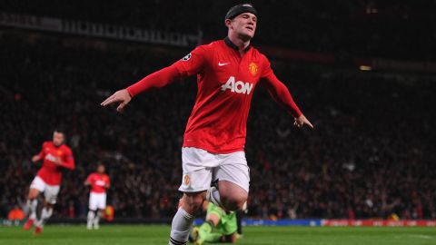 MANCHESTER, ENGLAND - SEPTEMBER 17:  Wayne Rooney of Manchester United celebrates scoring his team's third goal during the UEFA Champions League Group A match between Manchester United and Bayer Leverkusen at Old Trafford on September 17, 2013 in Manchester, England.  (Photo by Michael Regan/Getty Images)