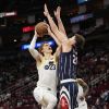 Utah Jazz's Lauri Markkanen (23) goes up for a shot as Houston Rockets' Alperen Sengun (28) defends during the second half of an NBA basketball game Thursday, Jan. 5, 2023, in Houston. Utah won 131-114. (AP Photo/David J. Phillip)