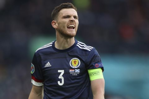 Scotland's captain Andrew Robertson reacts during the Euro 2020 soccer championship group D match between Croatia and Scotland at the Hampden Park stadium in Glasgow, Tuesday June 22, 2021. (Lee Smith, Pool Photo via AP)