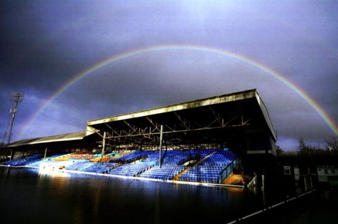 A rainbow over the stands at a flooded Gay Meadow, home of Shrewsbury Town. Shrewsbury's game against Kidderminster is off.