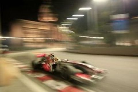 McLaren Formula One driver Lewis Hamilton in action qualifying for the Singapore Grand Prix on the Marina Bay City Circuit in Singapore, Saturday, Sept 26, 2009. Hamilton qualified in pole position for tomorrows race. (AP Photo/Maye-E Wong)