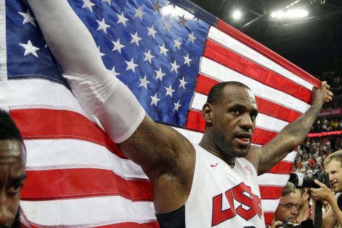 United States' LeBron James celebrates after the men's gold medal basketball game at the 2012 Summer Olympics, Sunday, Aug. 12, 2012, in London. USA won 107-100. (AP Photo/Eric Gay)