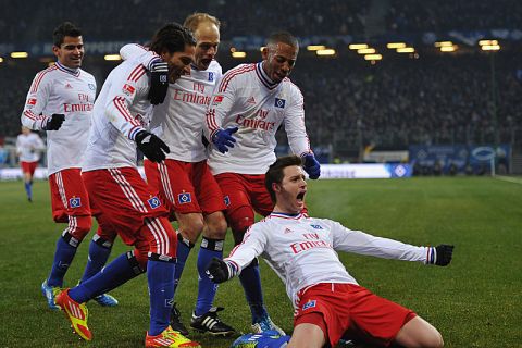 HAMBURG, GERMANY - FEBRUARY 04:  Jacopo Sala of Hamburg celebrates scoring his goal with Paolo Guerrero, David Jarolim and Dennis Aogo during the Bundesliga match between Hamburger SV and FC Bayern Muenchen at Imtech Arena on February 04, 2012 in Hamburg, Germany.  (Photo by Stuart Franklin/Bongarts/Getty Images)