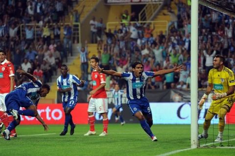 FC Porto´s forward from Colombia Radamel Falcao (2nd-R) celebrates after a goal scored by teammate Rolando Fonseca (2nd-L) against Benfica during their Super Cup football match at Aveiro Municipal Stadium in Aveiro, central Portugal, on August 7, 2010. AFP PHOTO/ FRANCISCO LEONG (Photo credit should read FRANCISCO LEONG/AFP/Getty Images)(Photo Credit should Read /AFP/Getty Images)