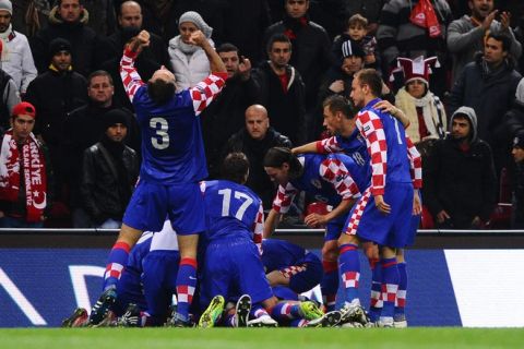 Players of Croatia celebrate after Verdan Corluka's goal against Turkey during their Euro 2012 Group A qualifying football match Turk Telekom Arena stadium in Istanbul, on November 11, 2011. AFP PHOTO / MUSTAFA OZER (Photo credit should read MUSTAFA OZER/AFP/Getty Images)