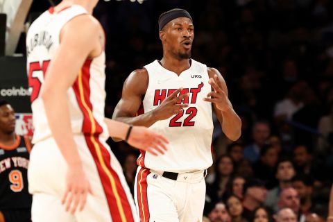 Miami Heat forward Jimmy Butler (22) reacts after his 3-point basket against the New York Knicks during the second half of an NBA basketball game, Friday, Feb. 25, 2022, in New York. (AP Photo/Jessie Alcheh)