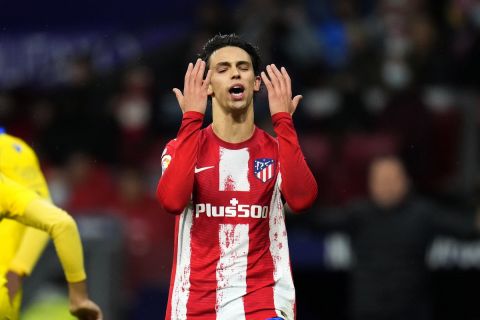 Atletico Madrid's Joao Felix reacts after missing a scoring chance during a Spanish La Liga soccer match between Atletico Madrid and Cadiz at the Wanda Metropolitano stadium in Madrid, Spain, Friday, March 11, 2022. (AP Photo/Manu Fernandez)