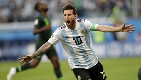 Argentina's Lionel Messi celebrates after scoring the opening goal of his team during the group D match between Argentina and Nigeria, at the 2018 soccer World Cup in the St. Petersburg Stadium in St. Petersburg, Russia, Tuesday, June 26, 2018. (AP Photo/Petr David Josek)