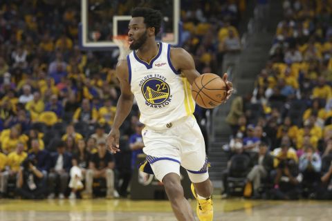 Golden State Warriors forward Andrew Wiggins (22) during Game 5 of basketball's NBA Finals against the Boston Celtics in San Francisco, Monday, June 13, 2022. (AP Photo/Jed Jacobsohn)